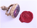 A magnificent and large gold and amethyst intaglio fob seal