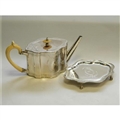 A pretty Victorian sterling silver teapot and stand