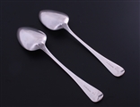 A pair of George III Old English pattern sterling silver table spoons