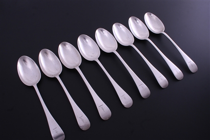 A matched set of eight Victorian Old English pattern sterling silver table spoons