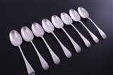 A matched set of eight Victorian Old English pattern sterling silver table spoons