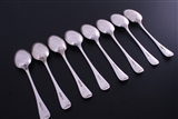 A matched set of eight Victorian Old English pattern sterling silver table spoons