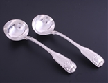 A pair of George IV sterling silver fiddle thread and shell sauce ladles