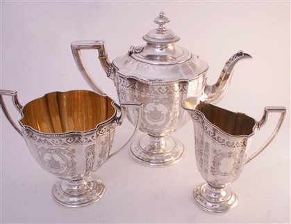 A Victorian three piece sterling silver tea set