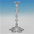 Pair of cast silver candlesticks