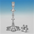 Pair of cast silver candlesticks