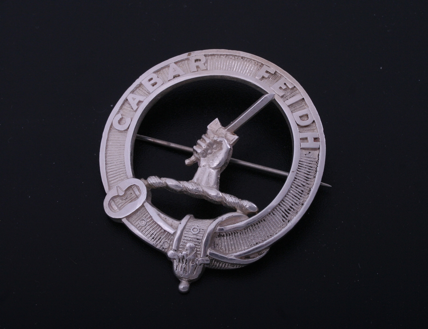 A Scottish Sterling Silver Clan Badge For Mackenzie